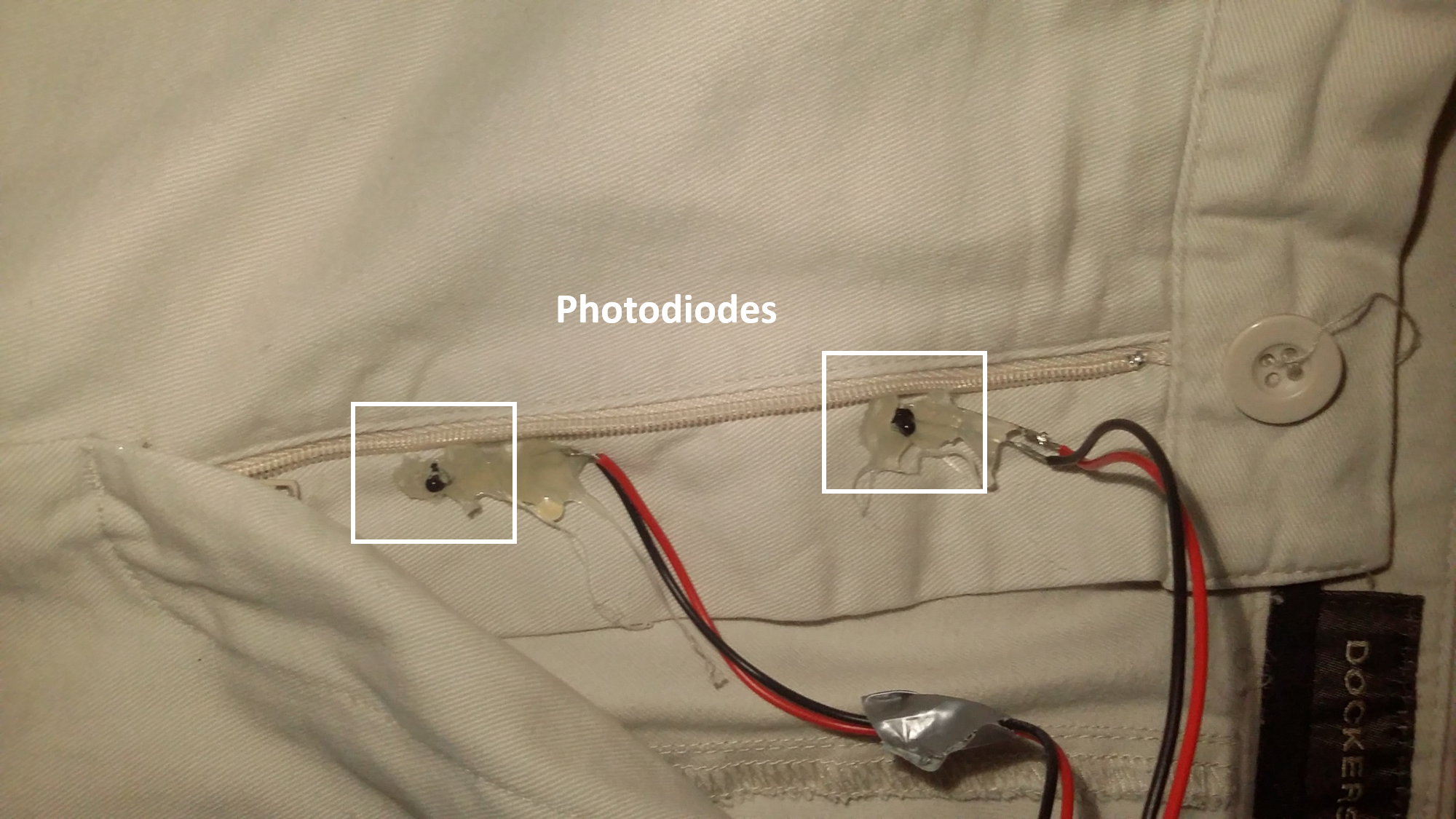 Photodiodes hot glued on pants.png