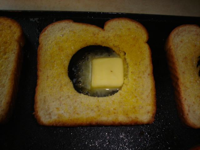 Place pat of margarine into bread hole.JPG