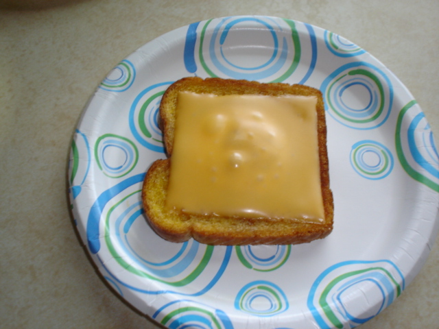 Remove to plate where residual heat melts cheese.JPG