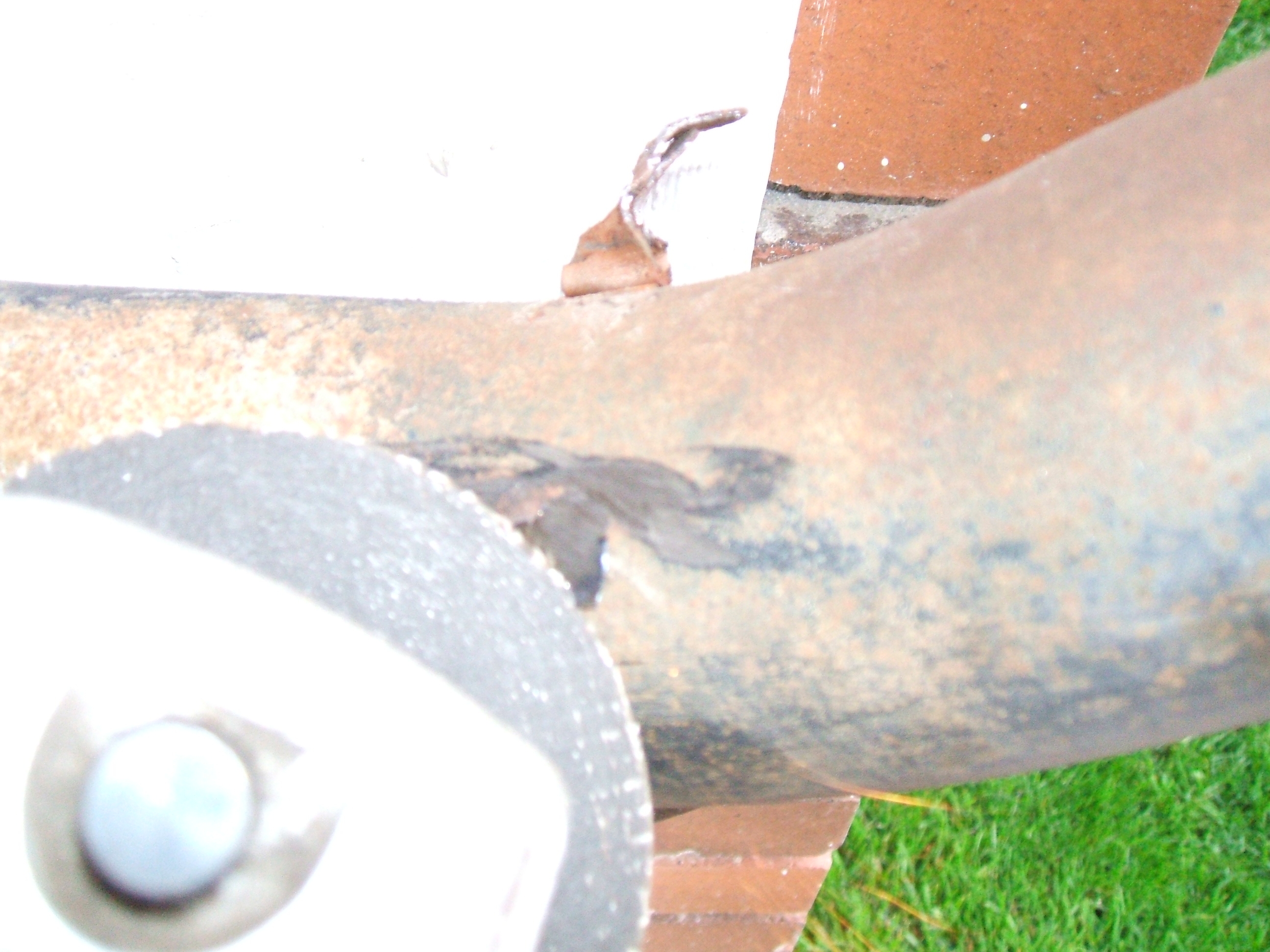 Removing metal tabs with angle grinder.JPG