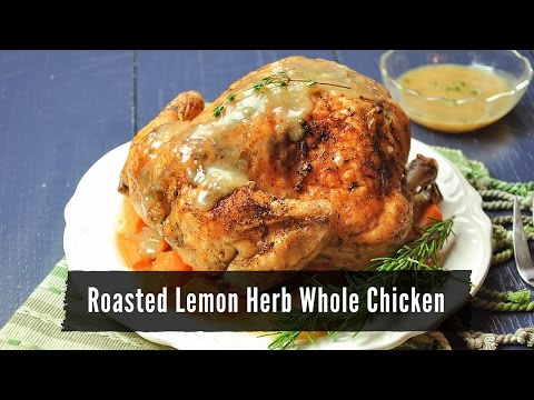 Roasted Lemon Herb Whole Chicken with Carrots and Onions