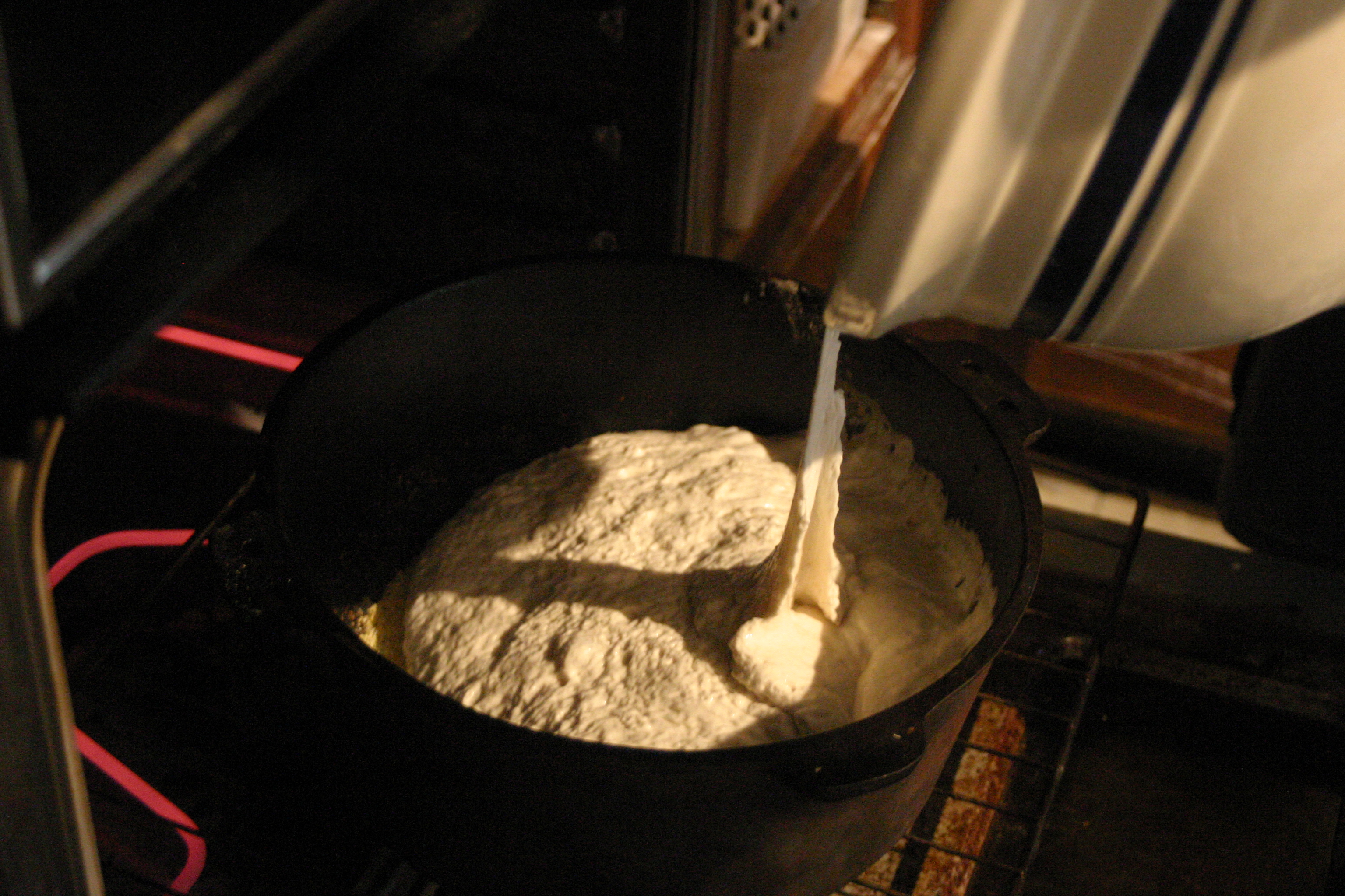 SD dough into round pan.JPG