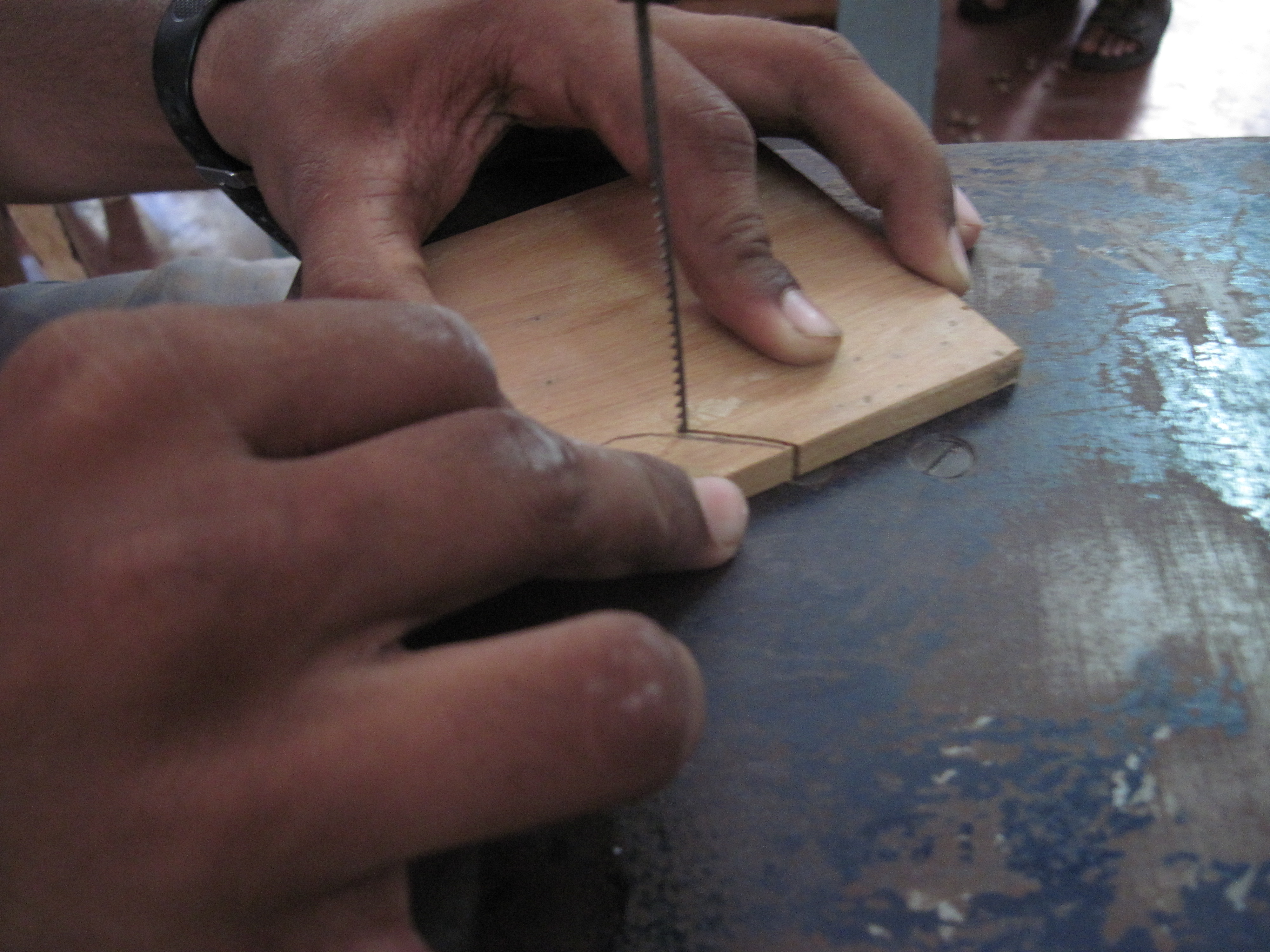 Showing cutting od wood.JPG