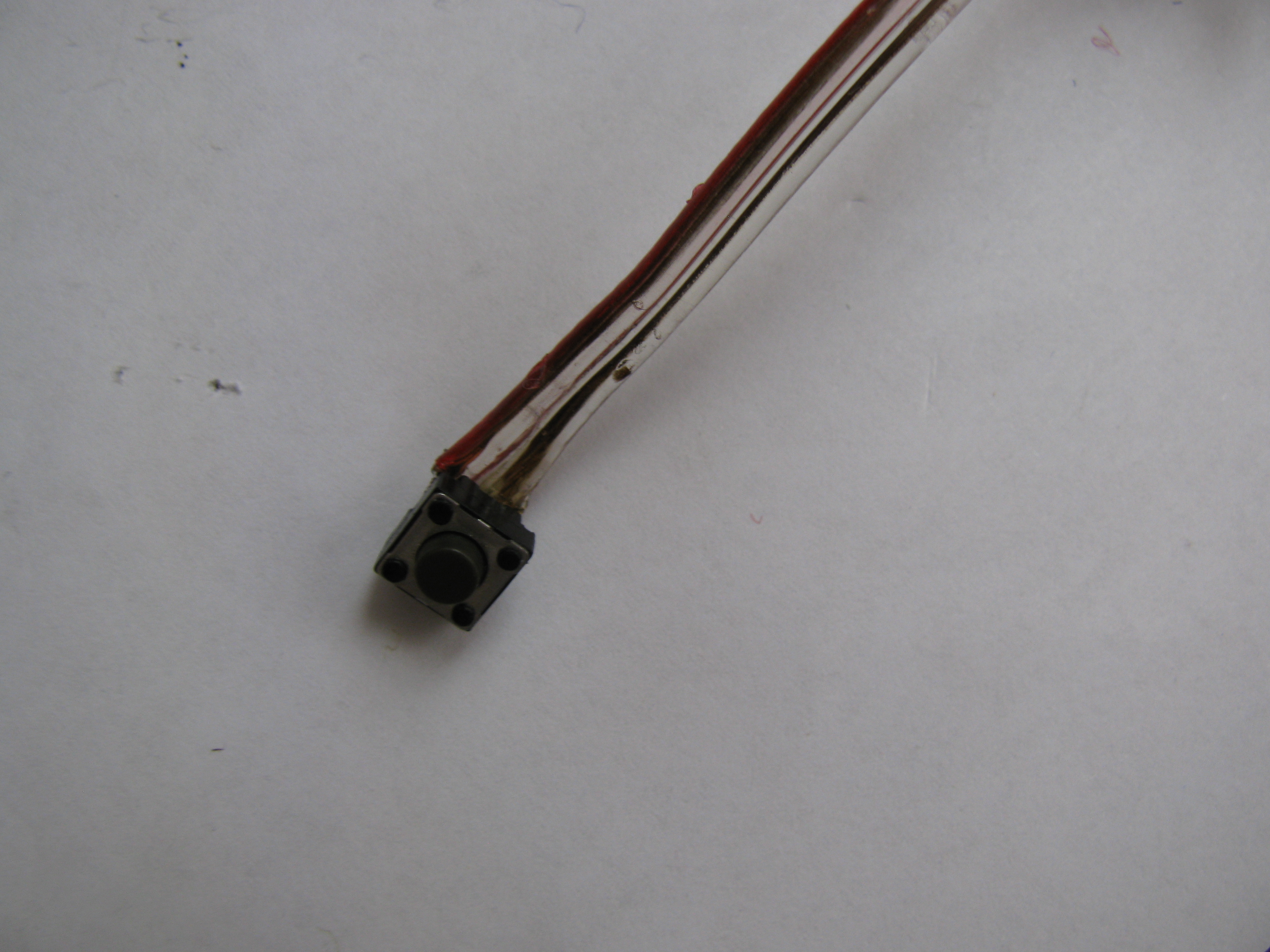 Soldering Button to its Wire.JPG