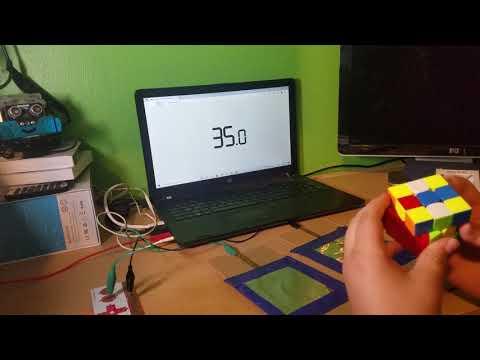 Solving a 3x3 rubixs cube with DIY speed stacks timer