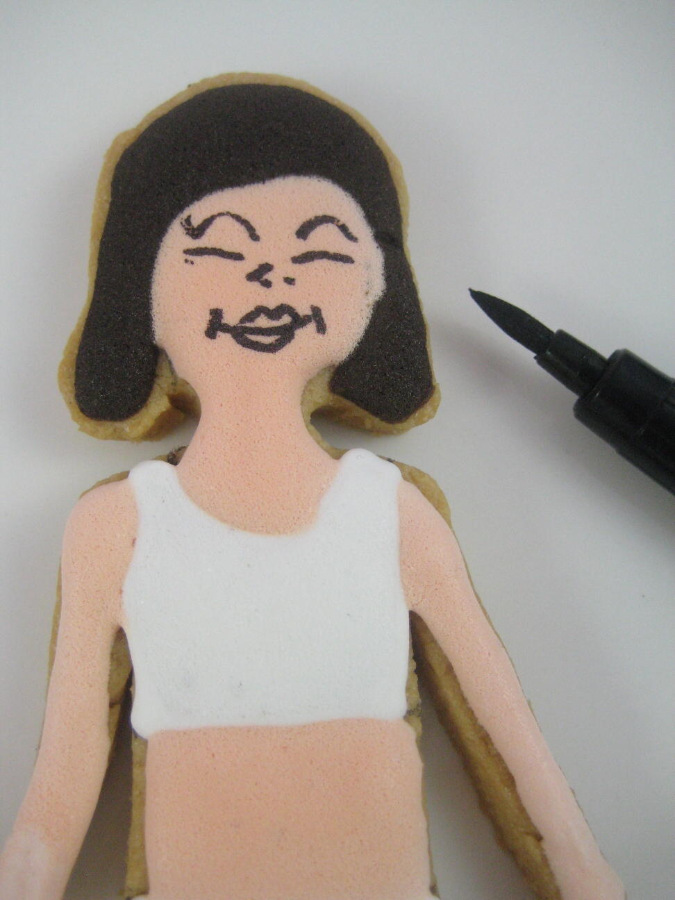 Sophie Doll tutorial draw on the face with edible pen.jpg