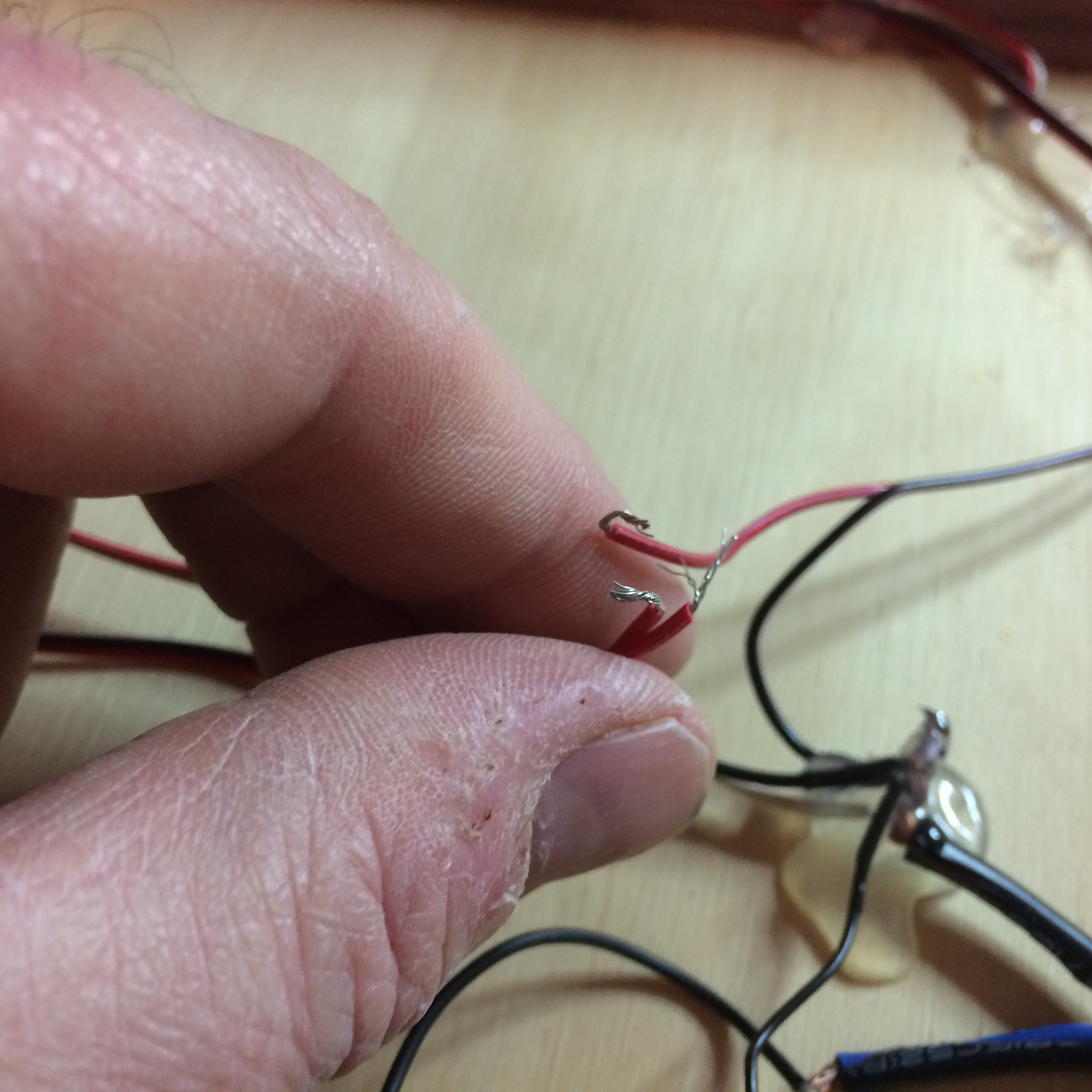 Step 16 - connect red wires together.JPG