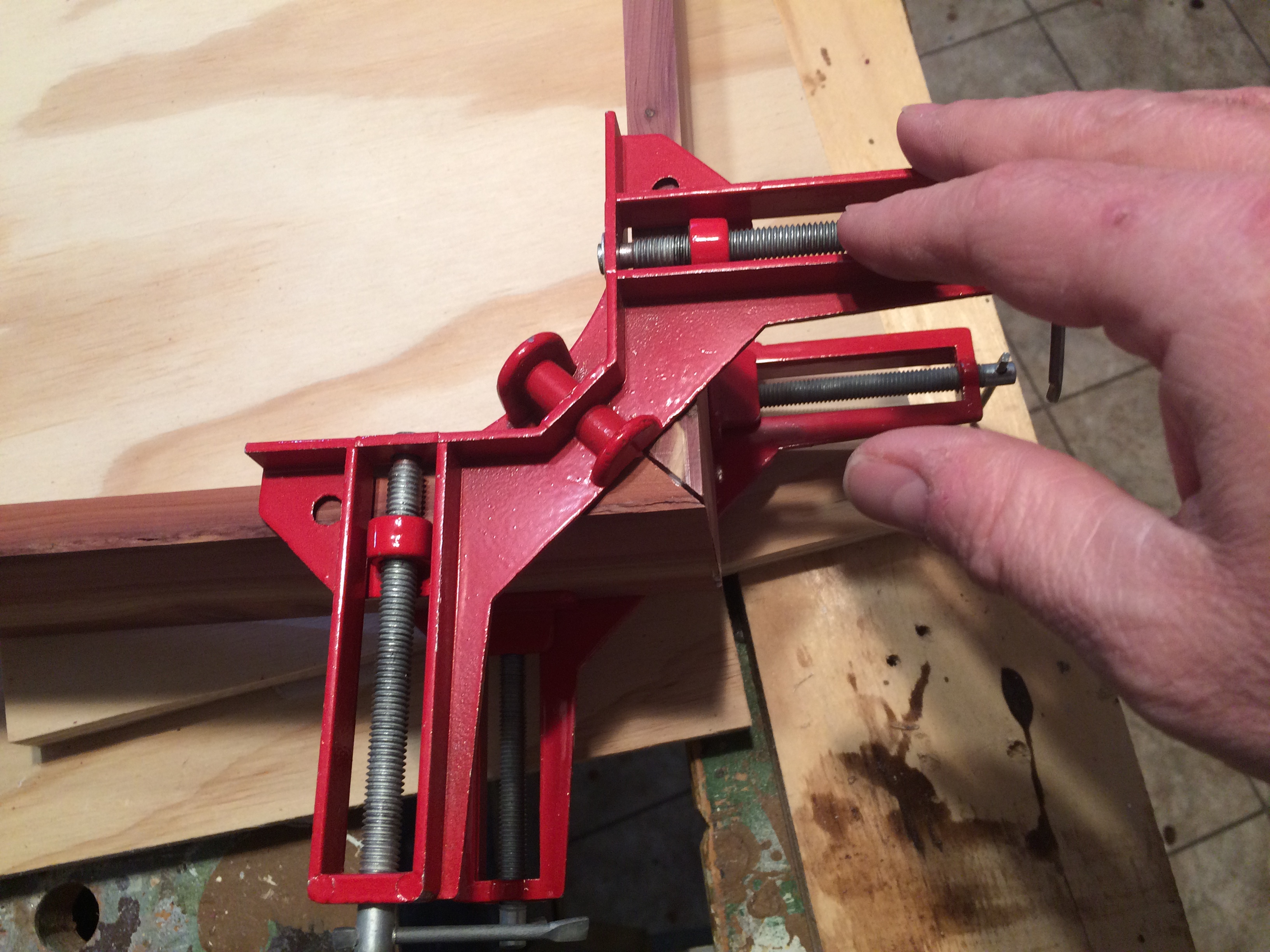 Step 2 - Gluing and clamping the third side.JPG