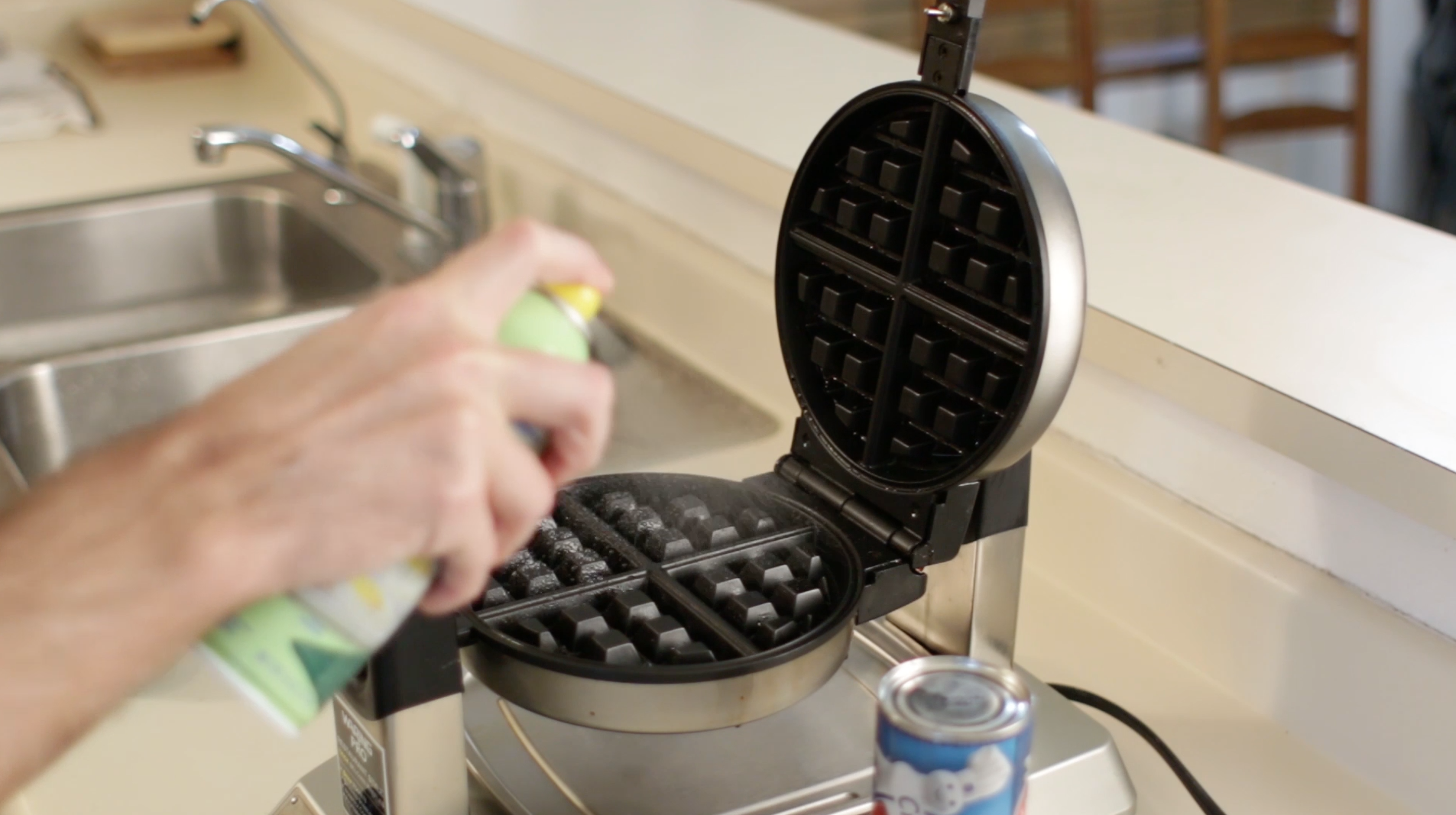 Step 2 spray waffles iron.png