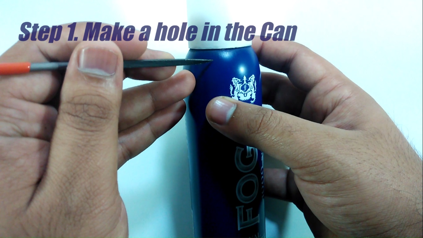 Step1.ake hole in the can .jpg