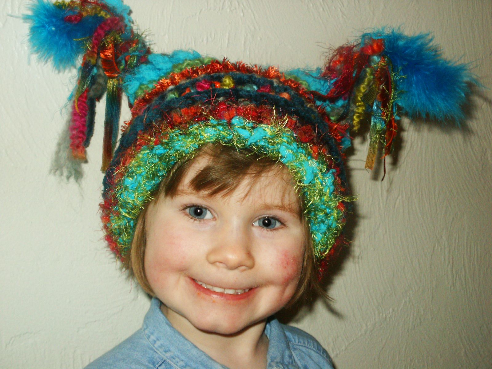 StoneRiverStudios_turquoise_multi_boa_ears2.JPG