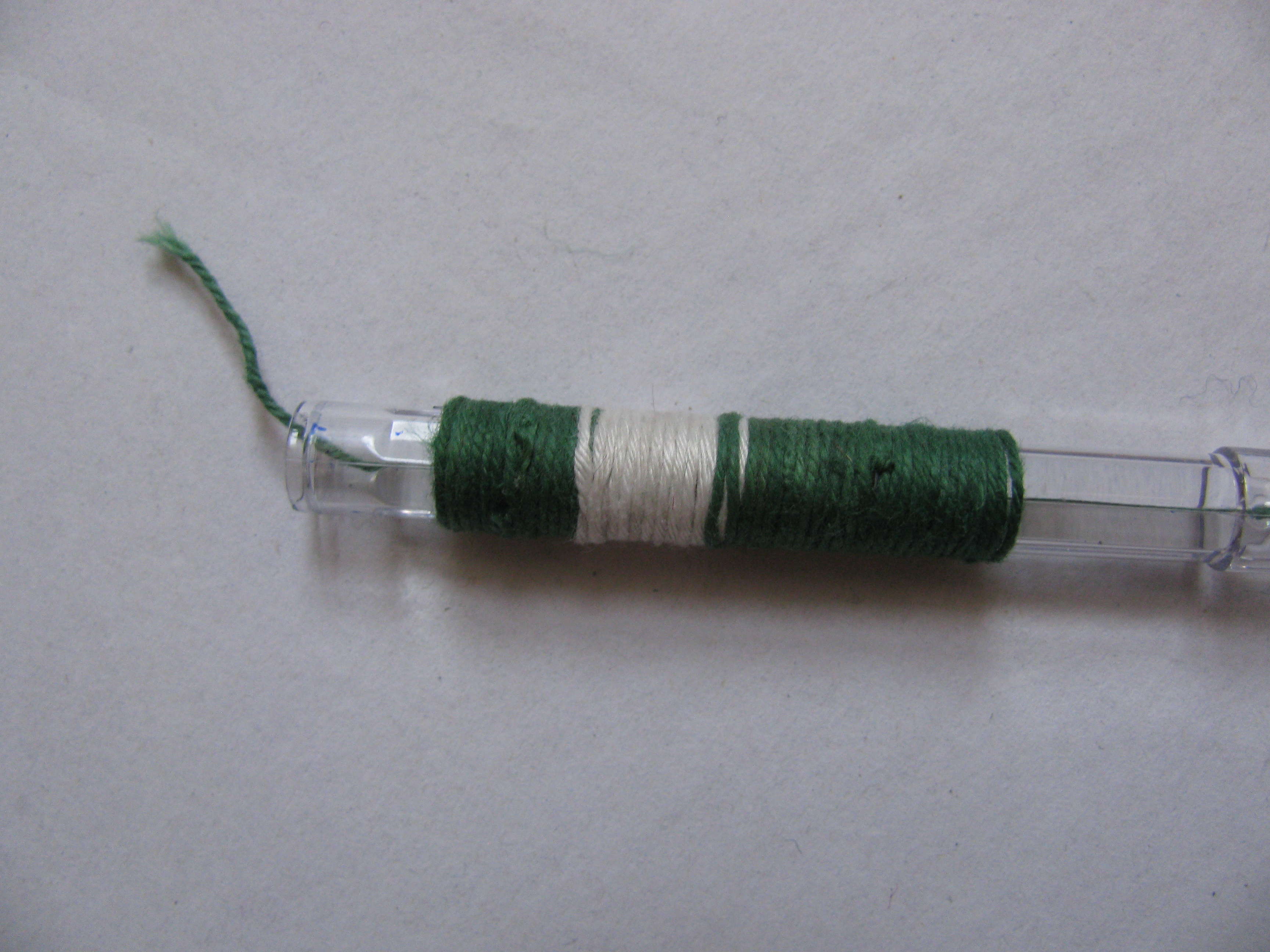 String around Pen Tube.JPG