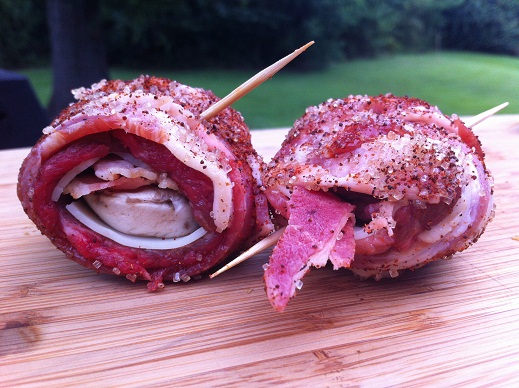 Stuffed steak wrapped in bacon.JPG