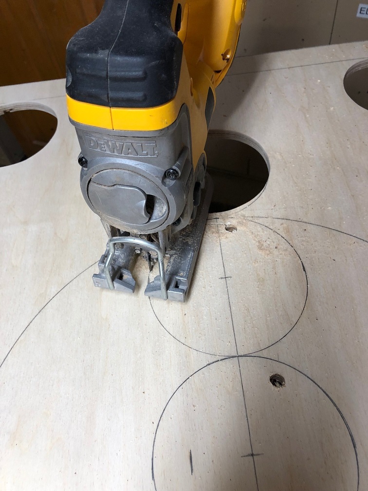 Target board using jig saw to cut holes.jpg