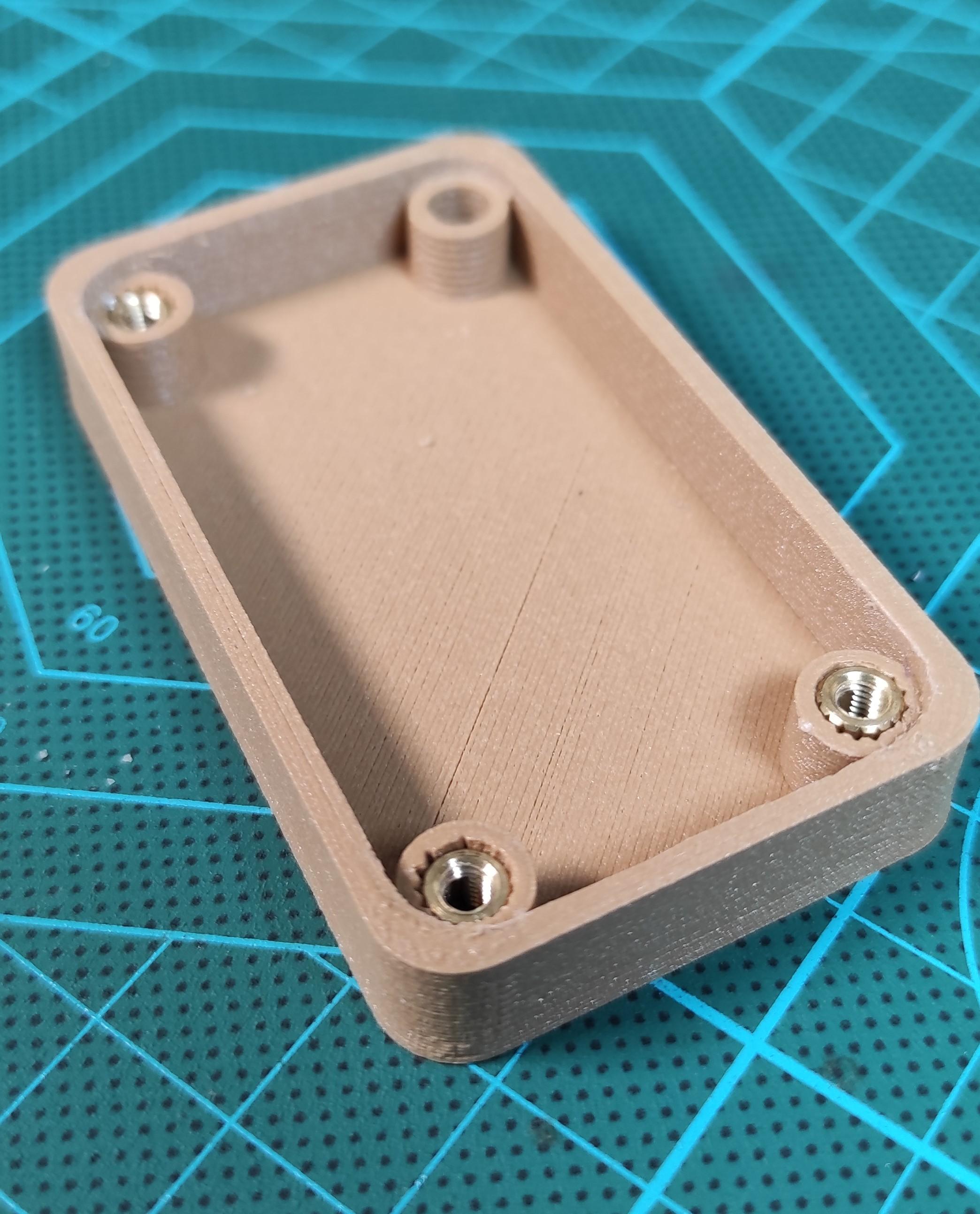 Threaded inserts on 3D printed housing.jpg