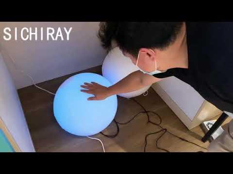 Touching glowing balloons