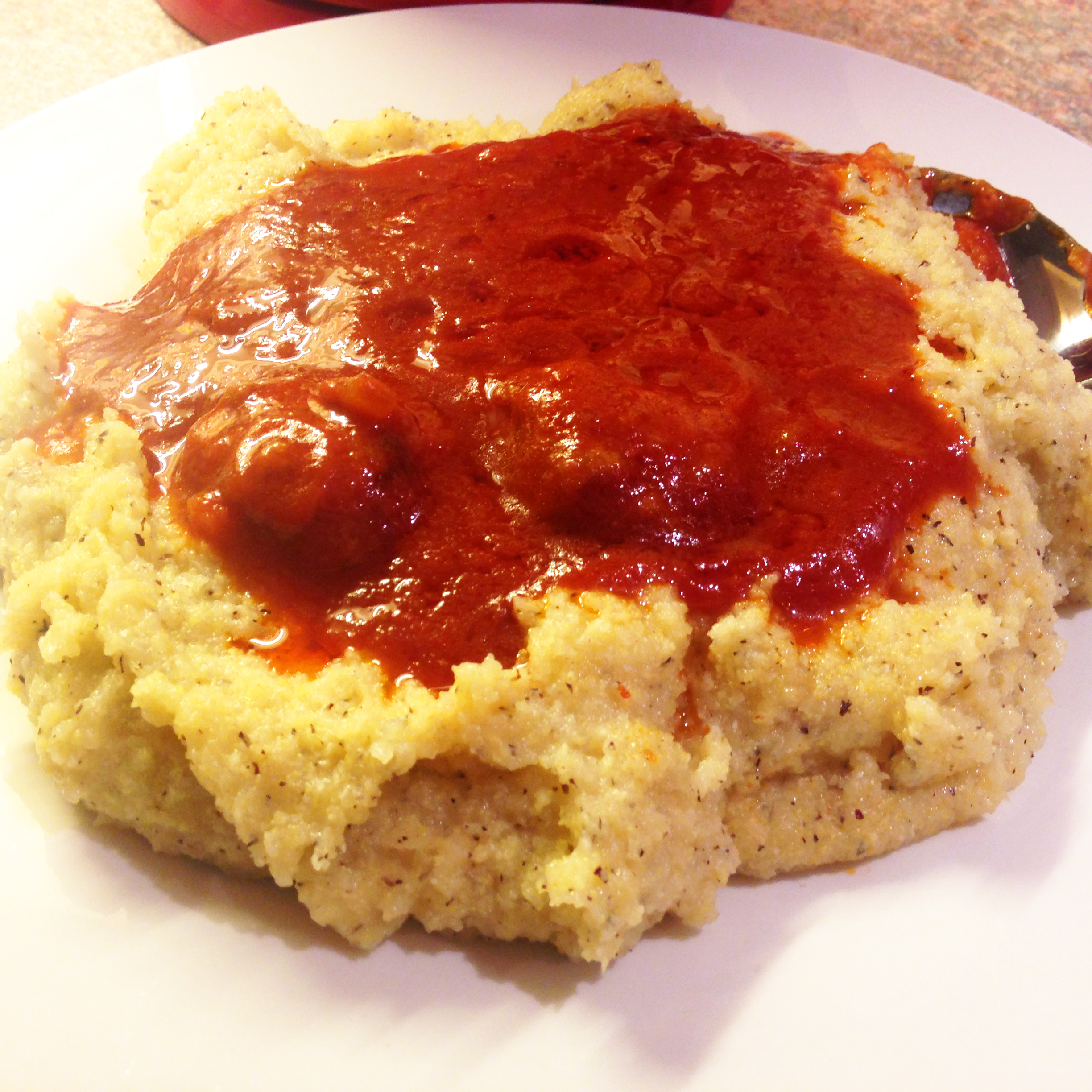 Traditional Italian Meatballs in Tomato Sauce and Polenta.jpg