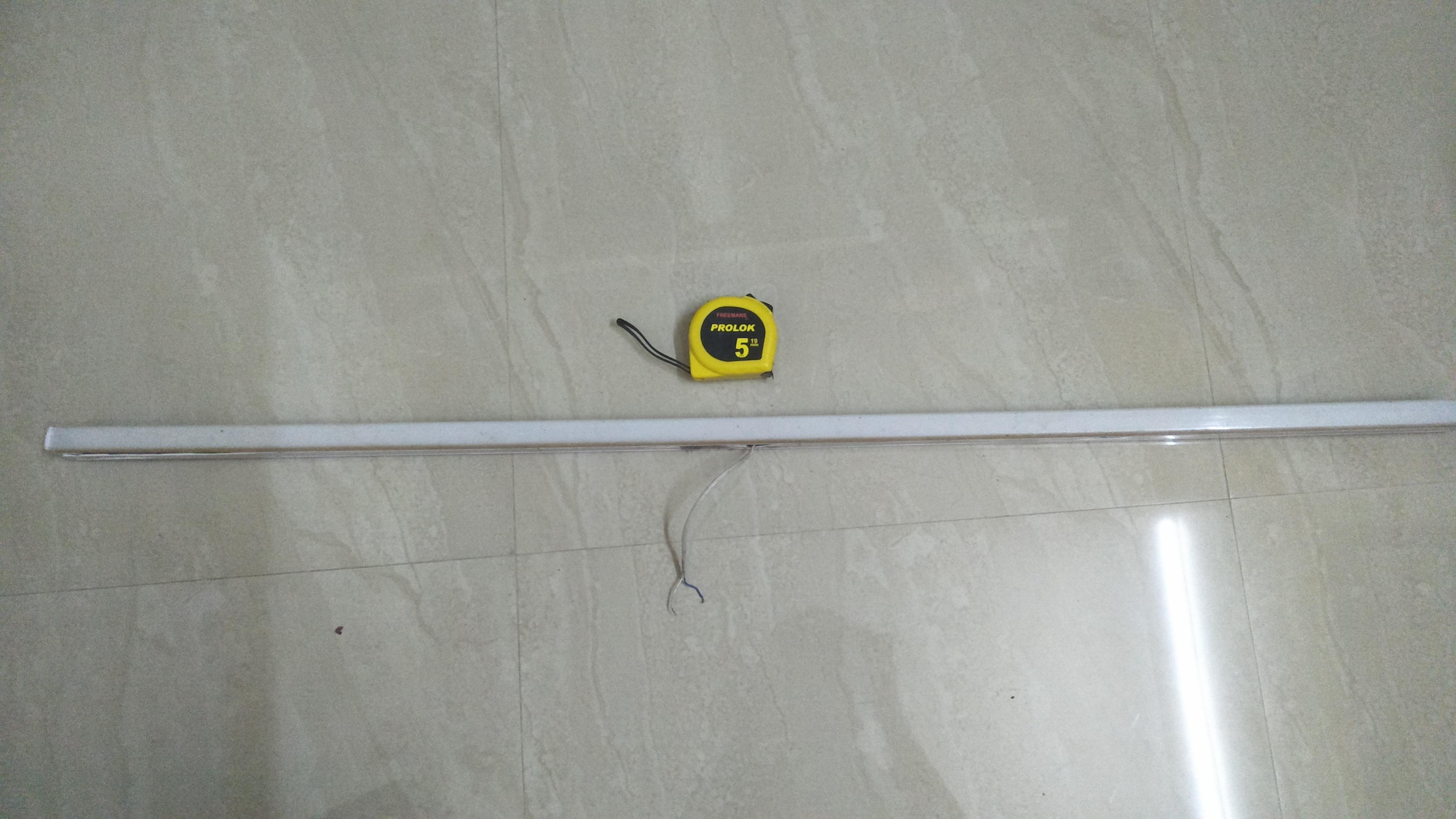 Tubelight with measuring tape.jpg