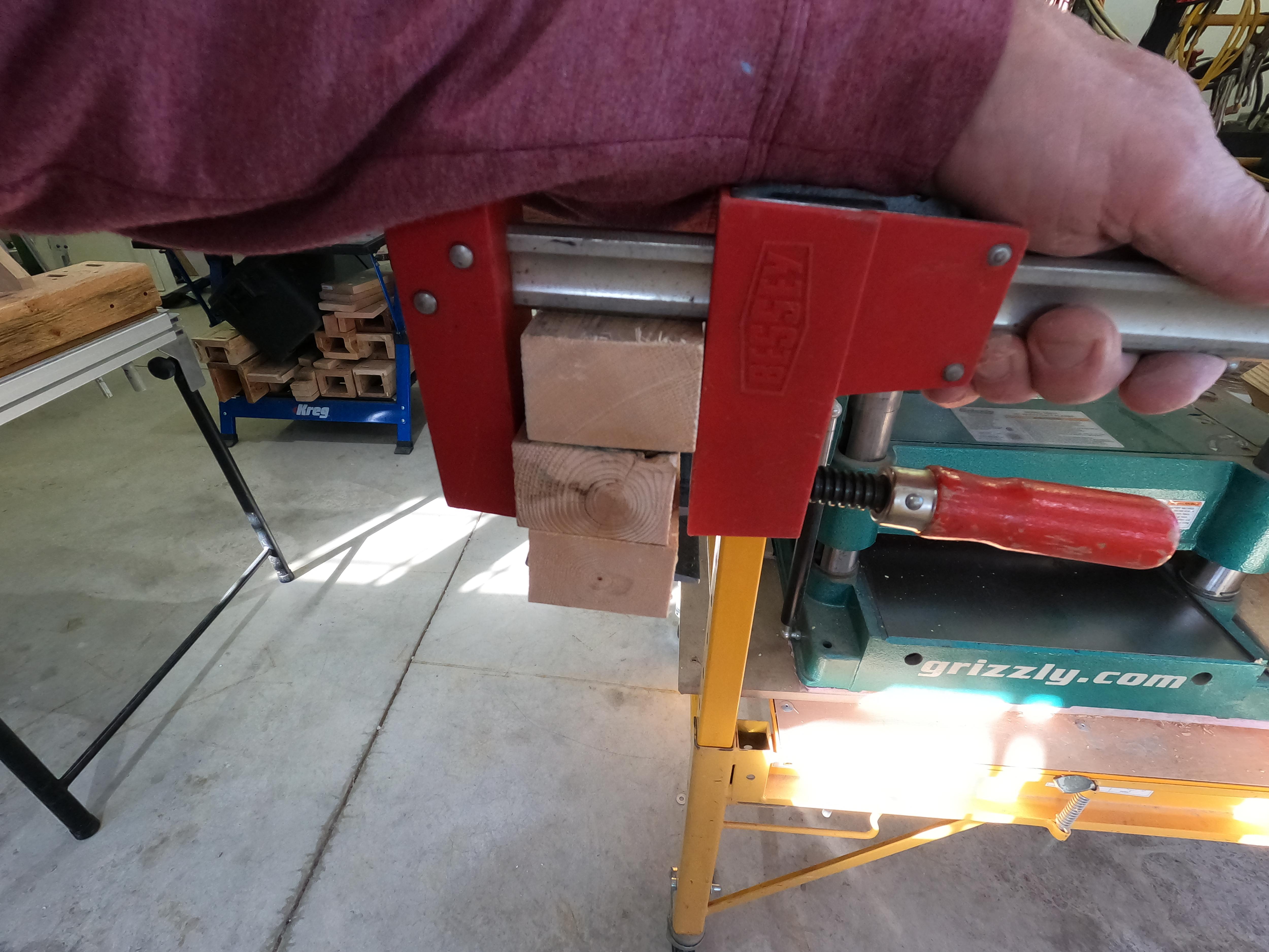 Using Bessey Clamp to Draw Uneven Boards Together.JPG