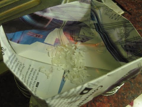 Water Boiling in paper box with Rice and Salt