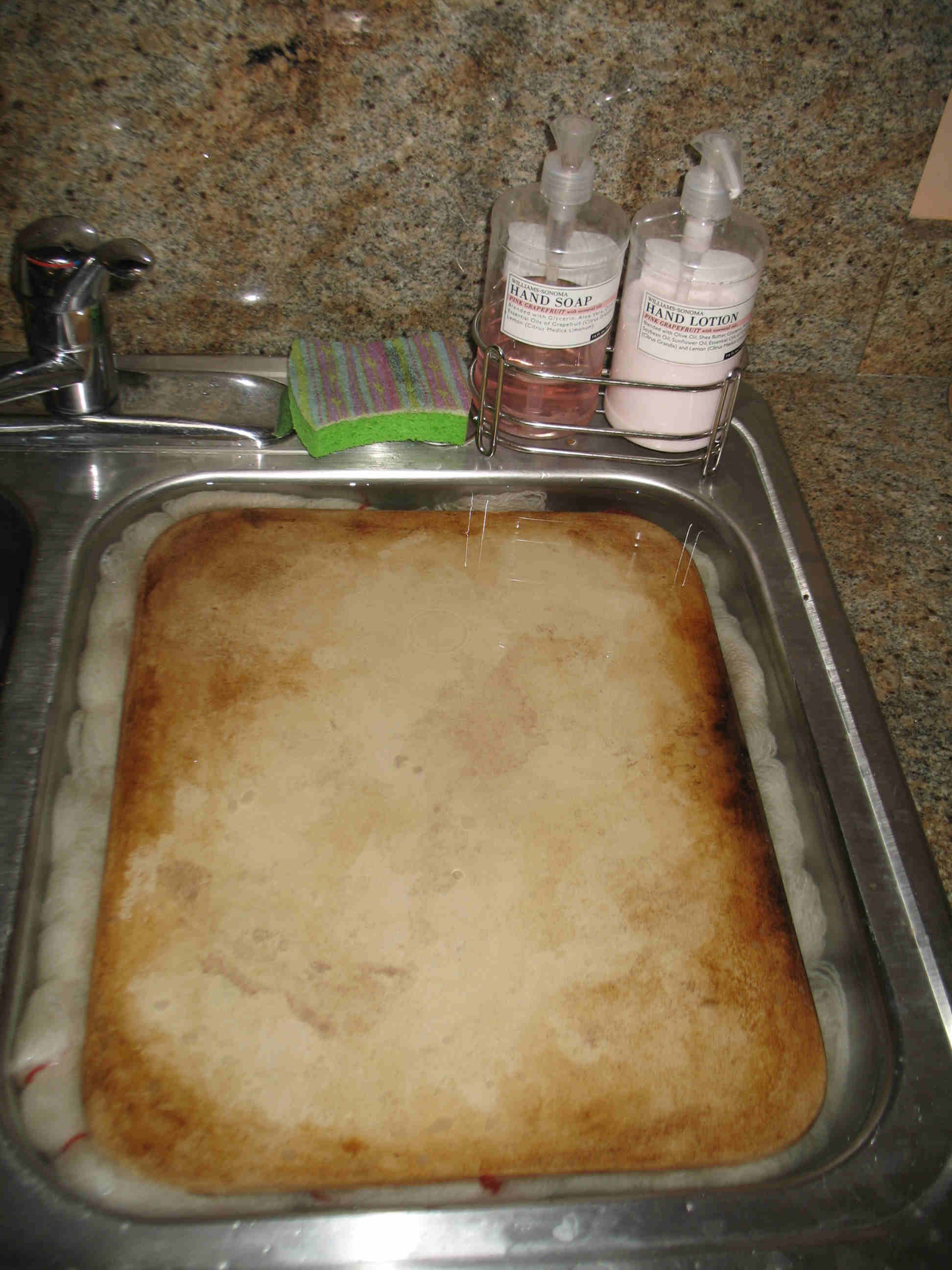 Yarn in sink with baking sheet.jpg