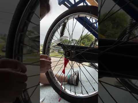 Yarning a bike wheel spoke