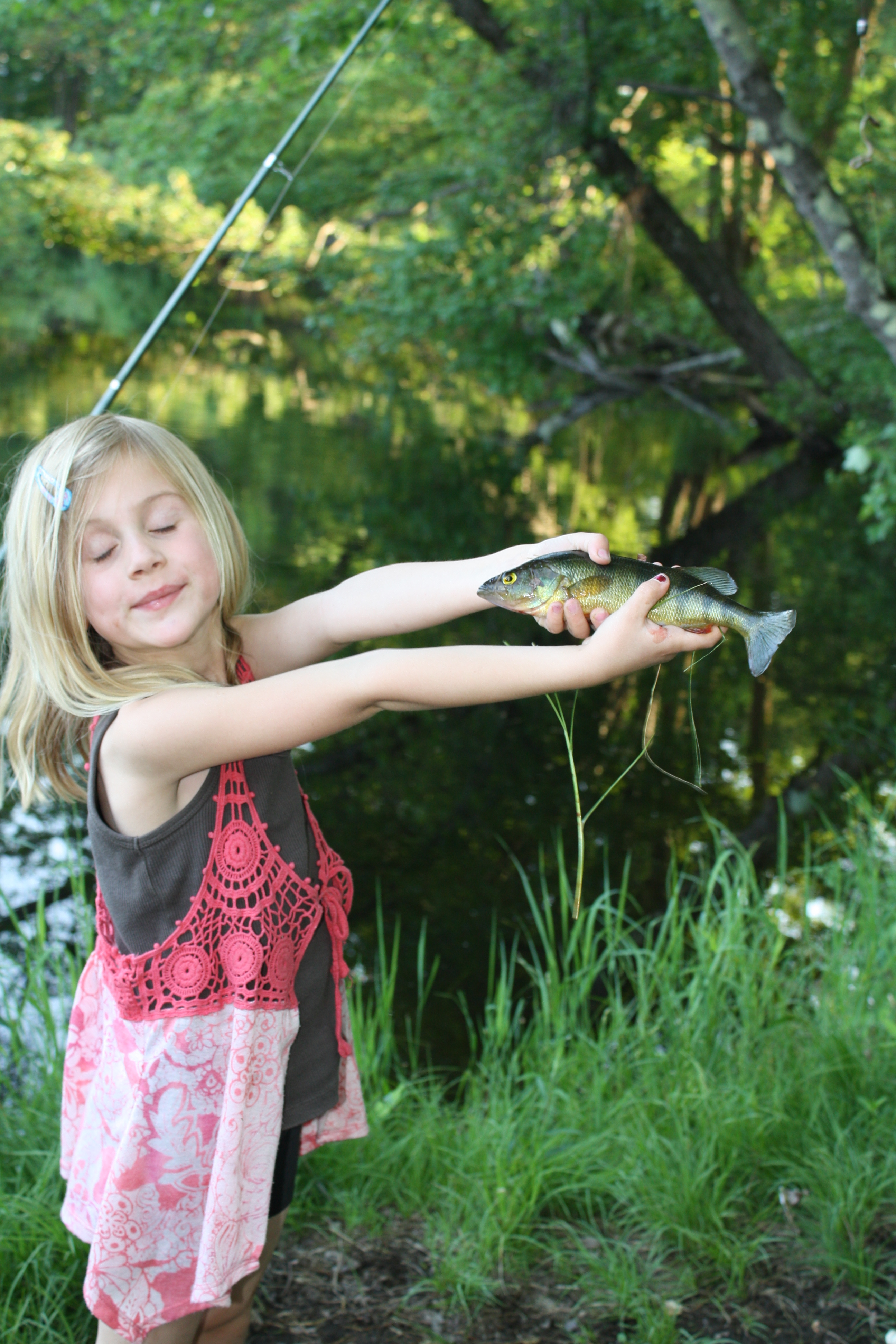 Zoe with yellow perch.JPG