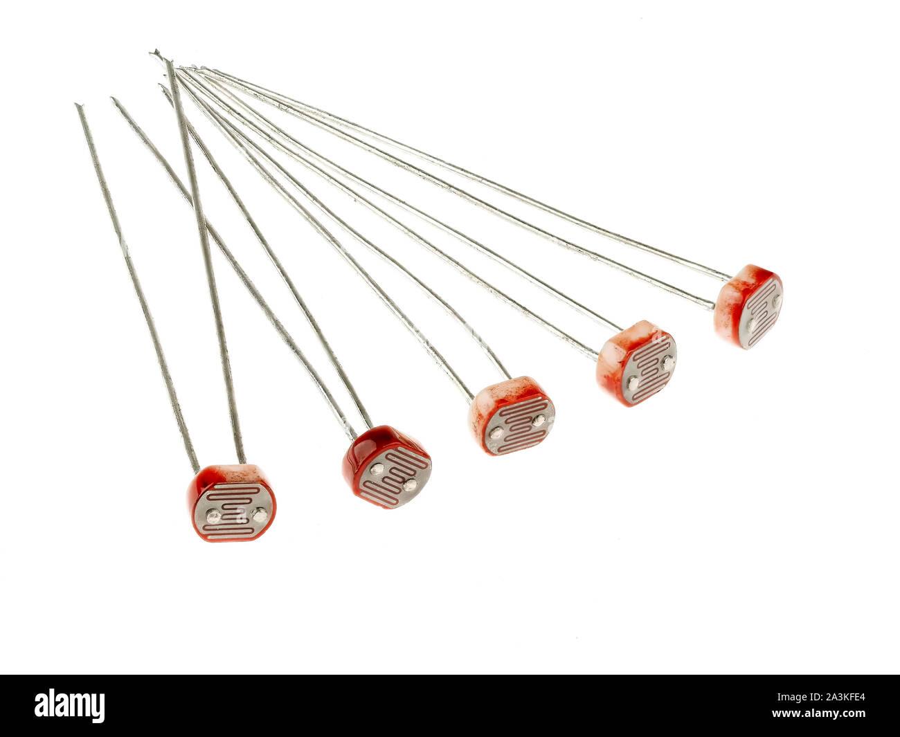 a-group-of-photoresistors-or-light-dependent-resistor-ldr-or-photo-conductive-cell-isolated-on-white-they-are-light-controlled-variable-resistor-2A3KFE4.jpg