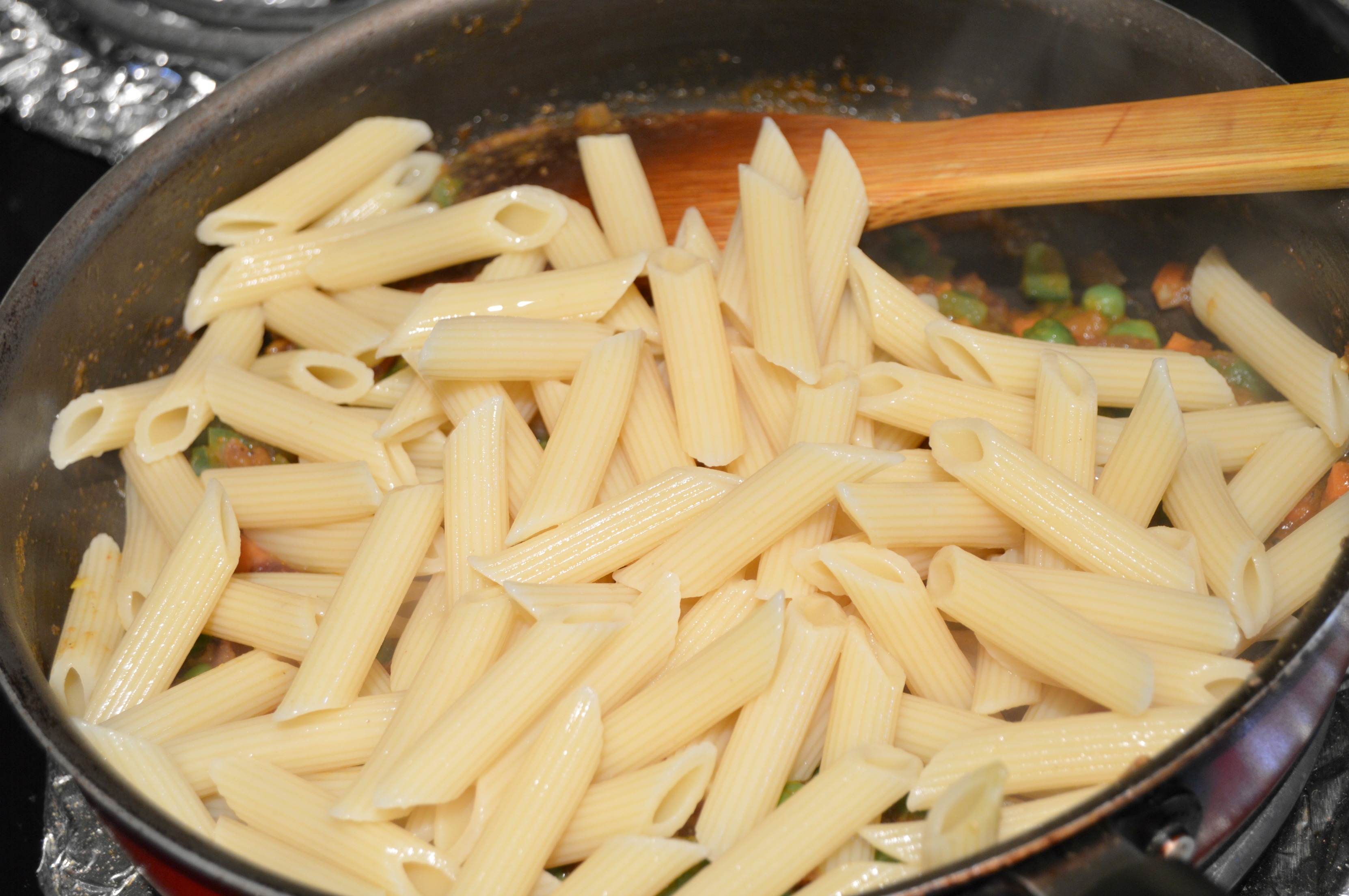 add pasta to the curry mixture.jpg