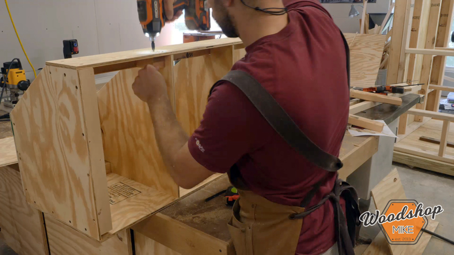 adding dividers to nesting box _ How to make a DIY chicken coop.jpg