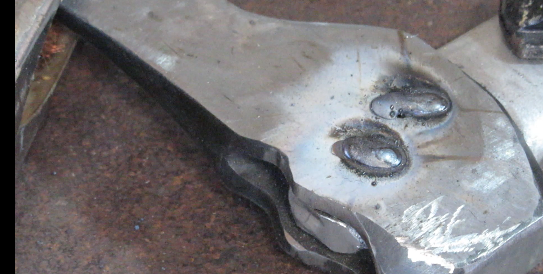 aluminum axe head welding spots.png