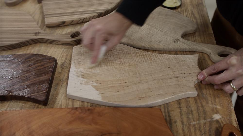 applying-finish-curly-maple-charcuterie-board.jpeg