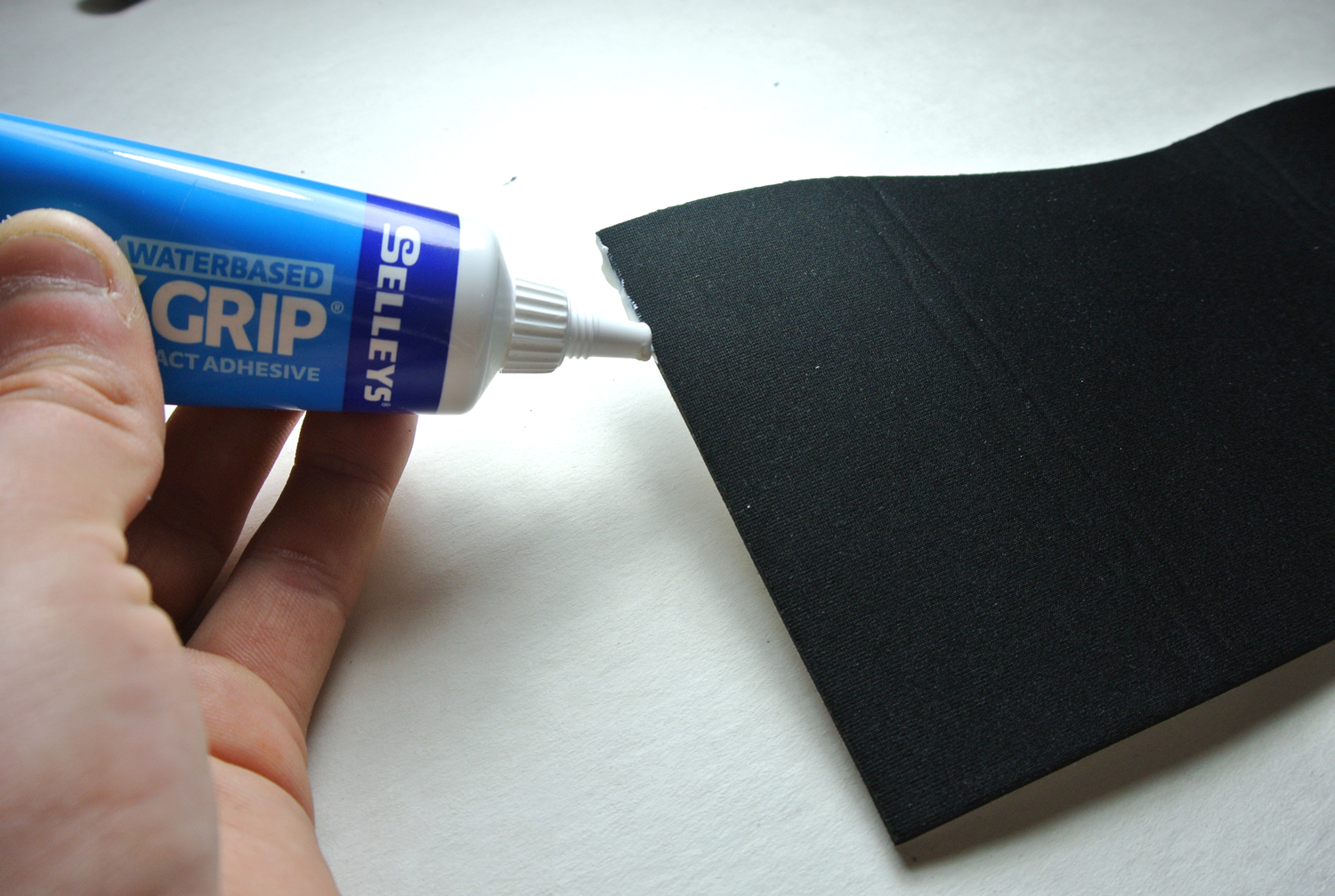 applying-glue-to-stubby-holder.jpg