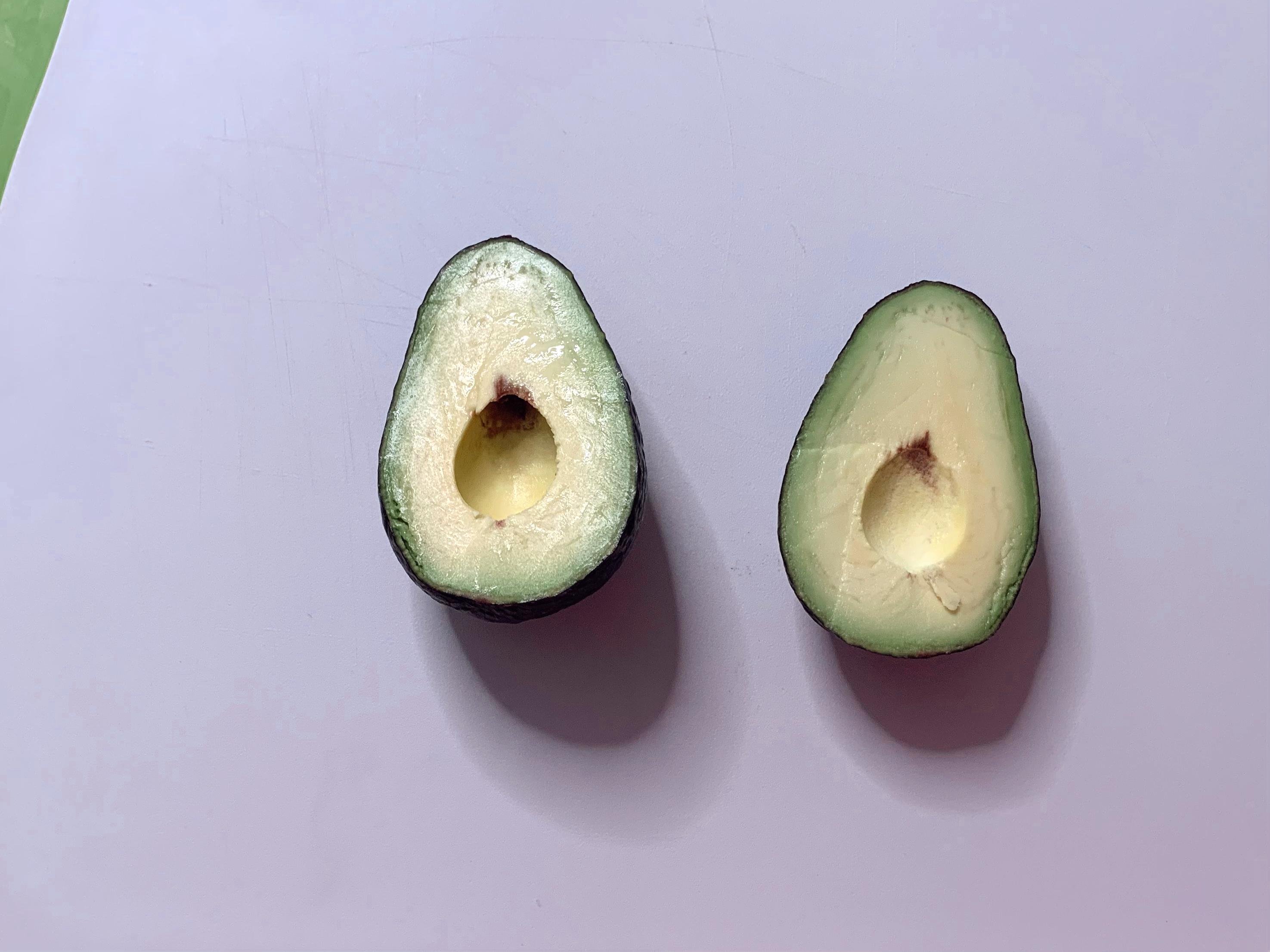 avocado cut in half and brown spots out.JPG