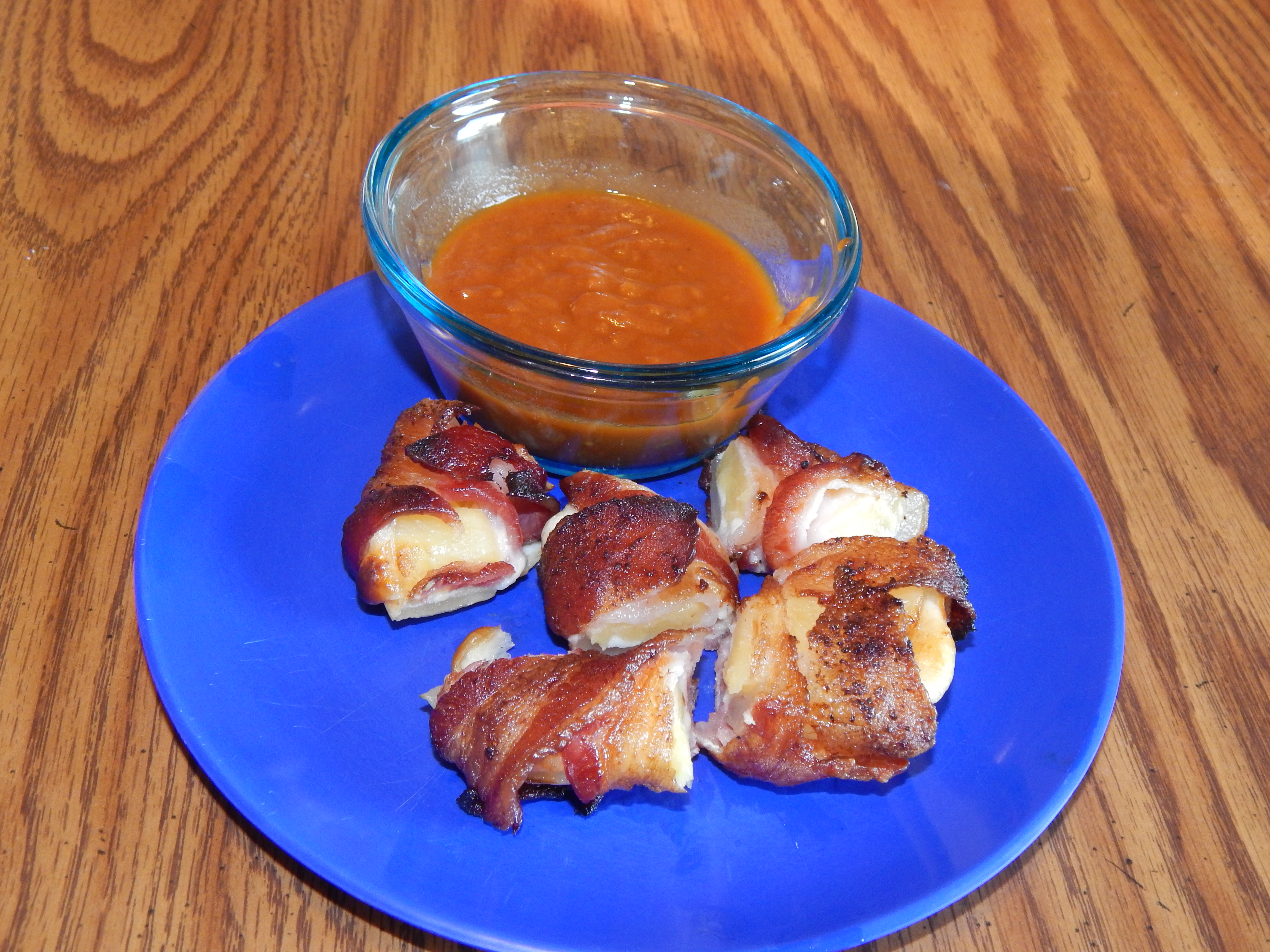 bacon-wraps-cut-and-served-with-marinara-sauce.JPG