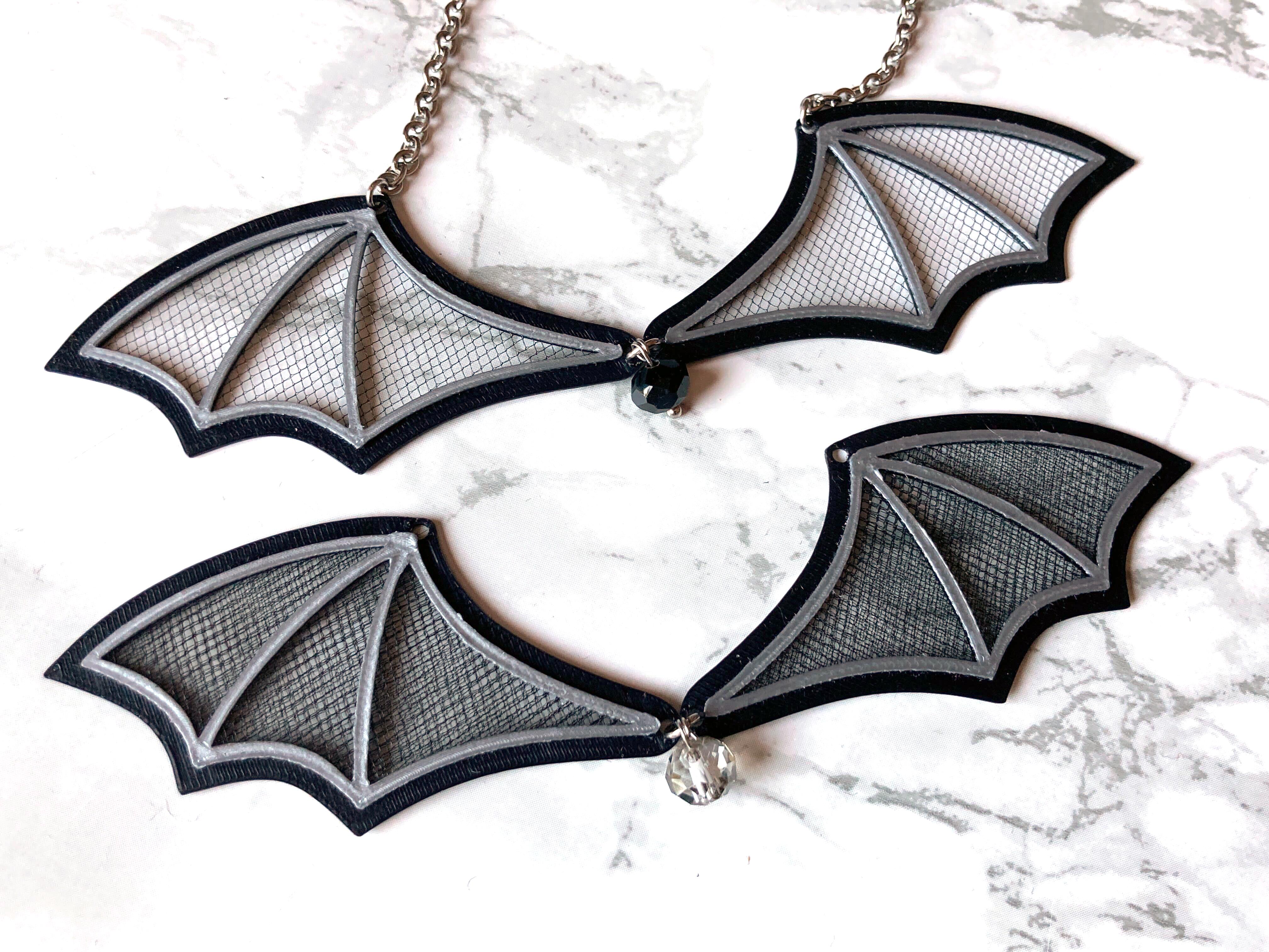 bat wing necklace compare.jpg