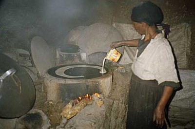black clay plate over a fire.jpg