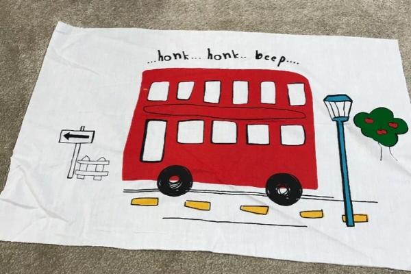 bus fabric remnant for wall hanging.jpg