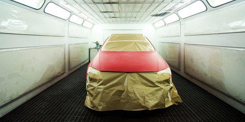 car-covered-with-mask-stands-in-the-spray-booth-royalty-free-image-520796623-1549306620.jpg