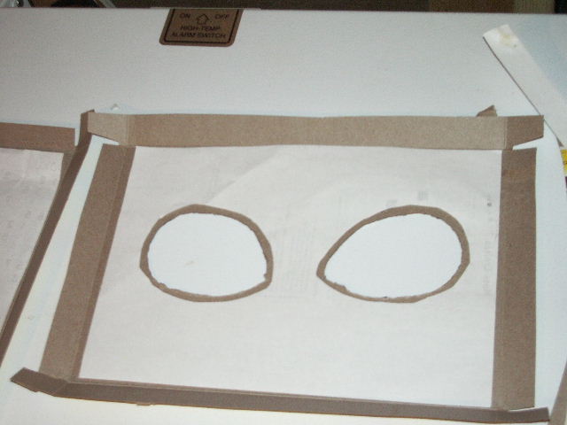 cereal_box_paper_eye_shape_glued_on.JPG