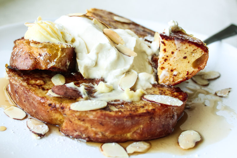 challah french toast with maple whipped cream and almonds.JPG