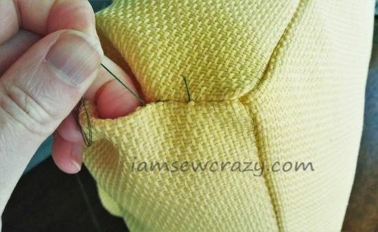 closing the opening of the pillow by hand-sewing.jpg