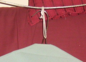 clothespin hanger - hanging over clothesline (cropped 2).jpg