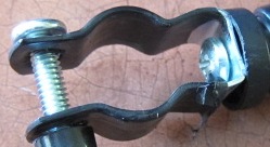 conduit clamp with bolt.jpg