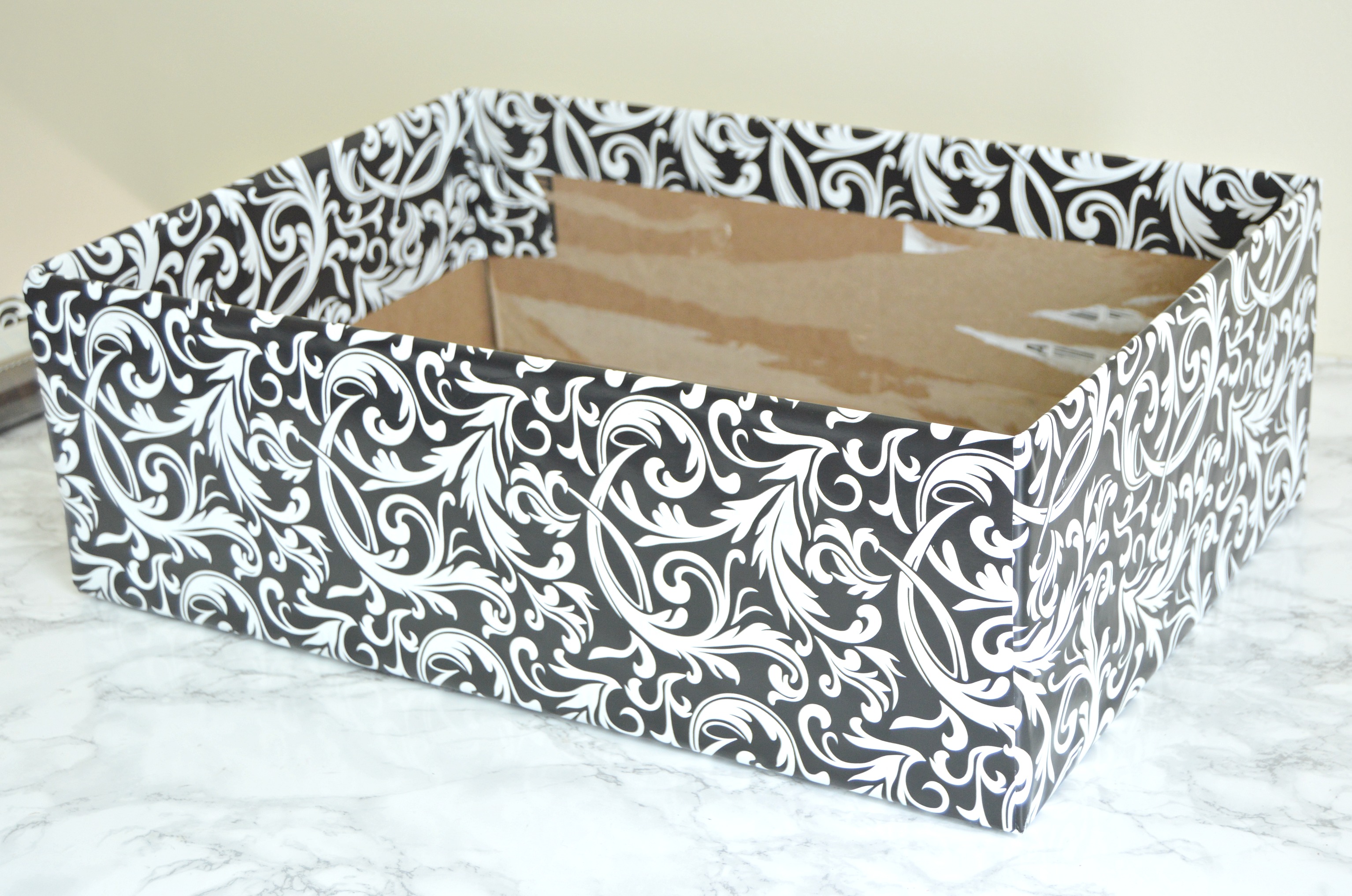 cover the long sides of the box with gift wrapping paper.jpg