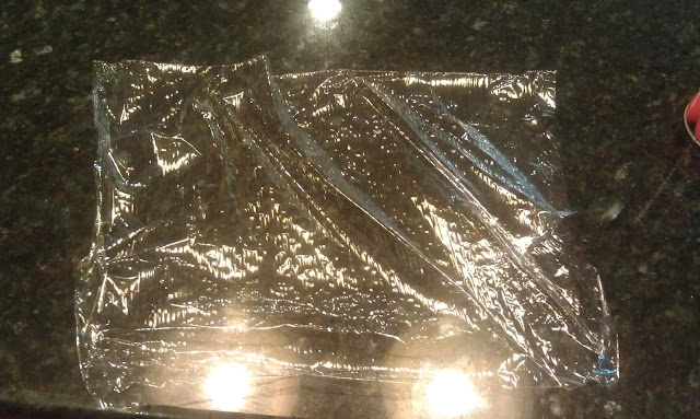 cut small piece of plastic wrap.jpg