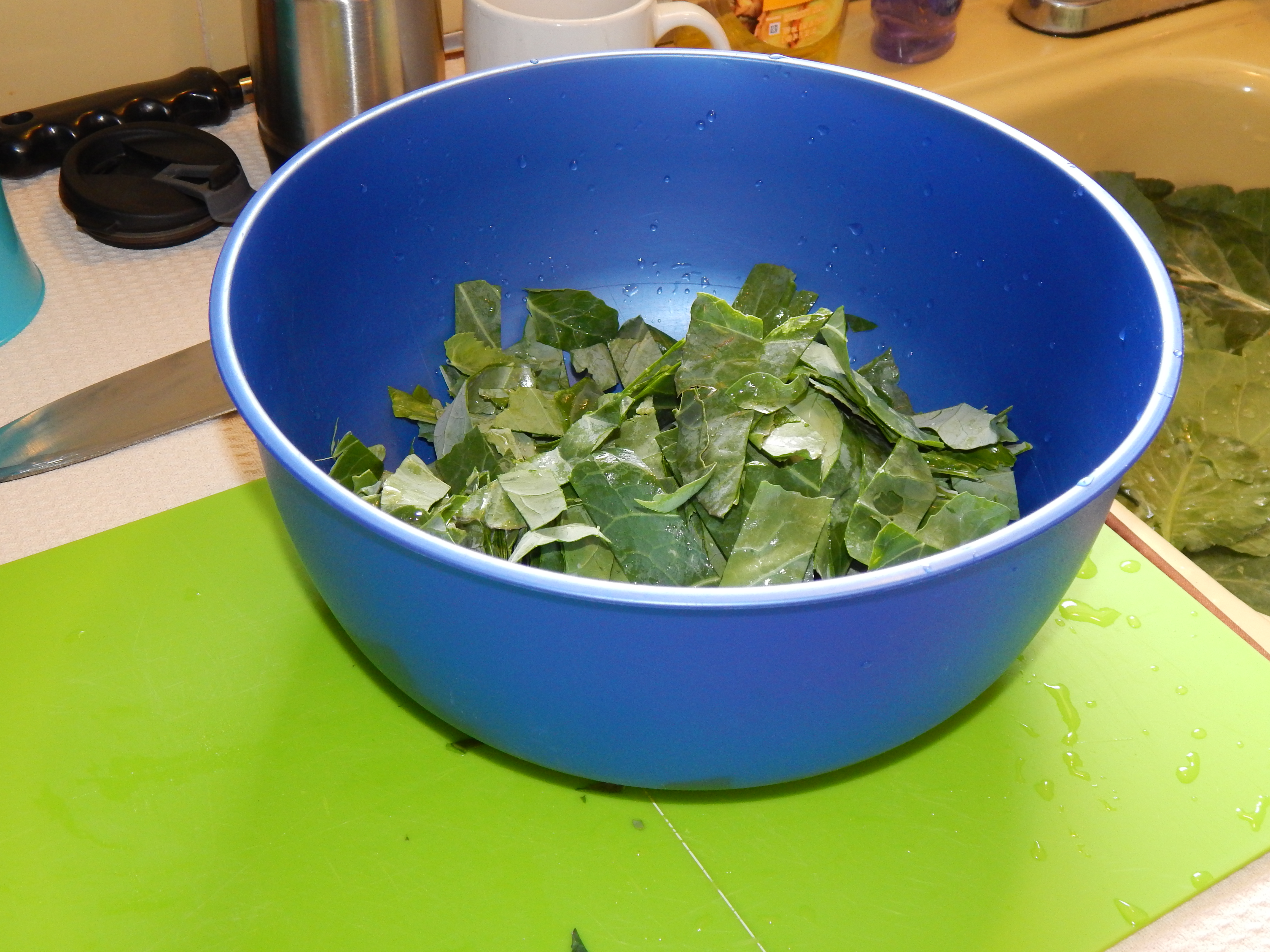 cut up collard greens in a bowl.jpg