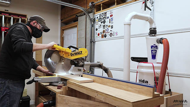 cutting lumber at miter saw.jpg