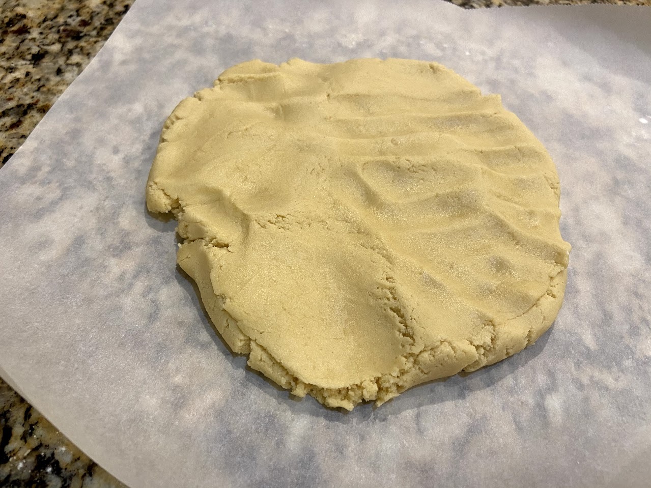 dough press before parchment.jpg