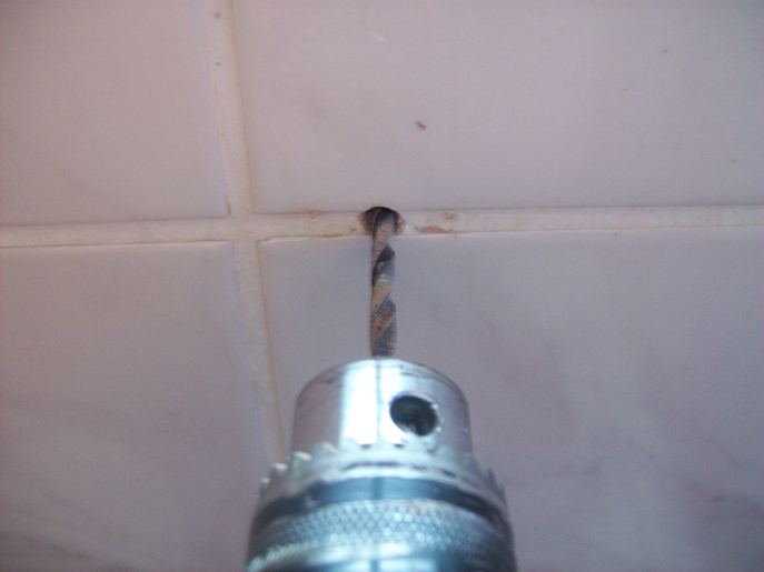 drill hole in wall.jpg